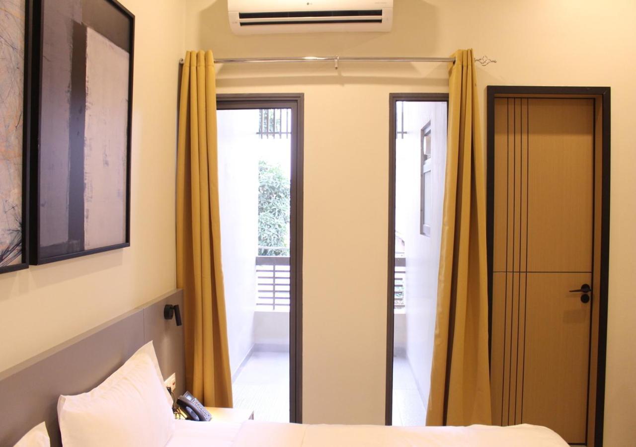 Ixoras Hotel Lemba Киншаса Екстериор снимка